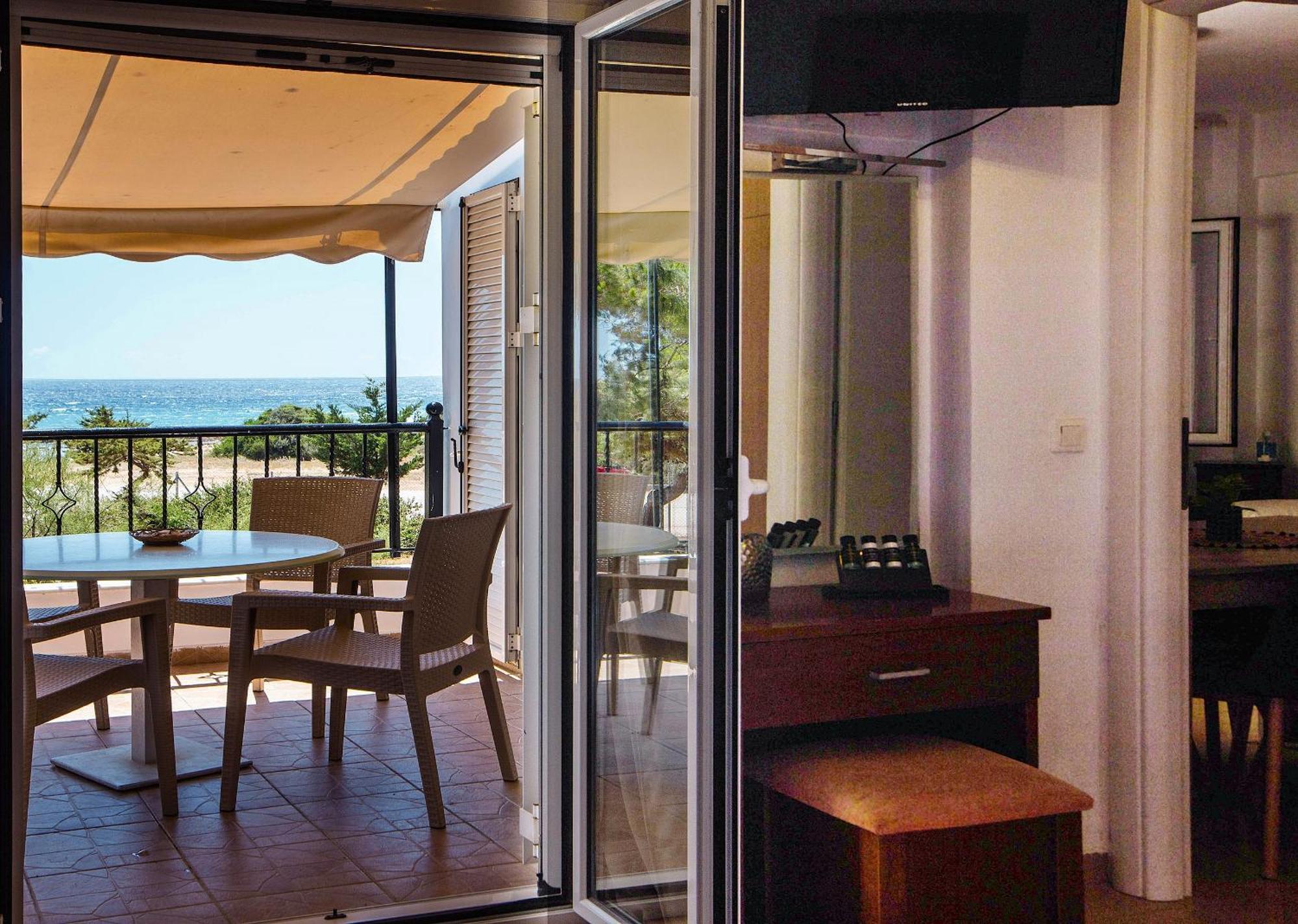 Romanos Beach Villas Bagian luar foto